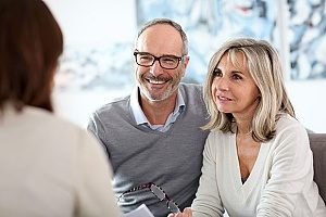 retired workers who are speaking to financial consultants about their 401(k) plan they started multiple years ago