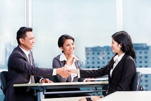 business partners hiring an Investment Management Consultant